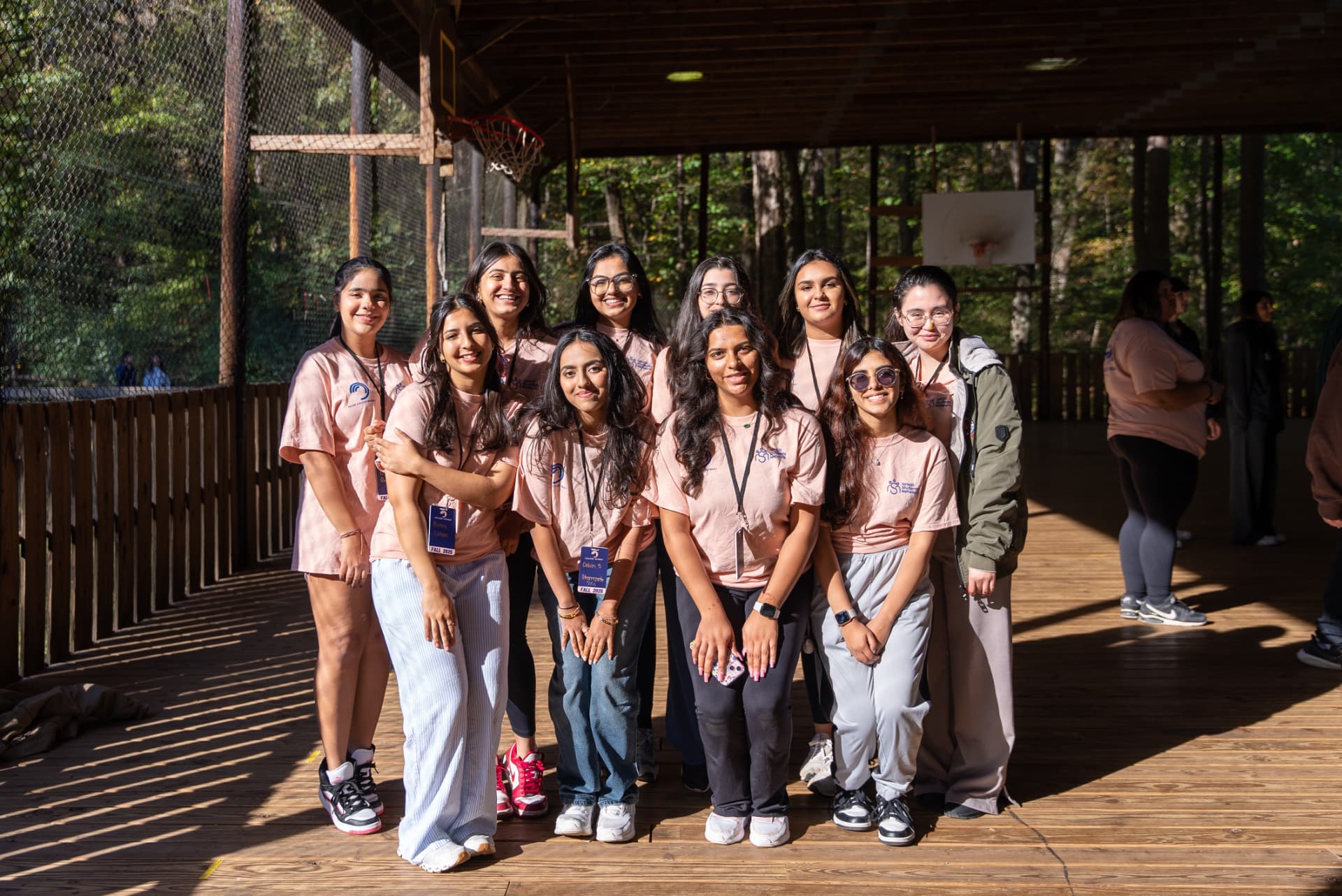 A cabin group posing together at a College Retreat